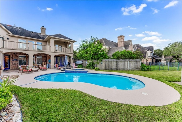 7601 Dijon Lake Dr, Corpus Christi, TX 78413 - view of swimming pool with a patio, a fenced backyard, and a pool with connected hot tub