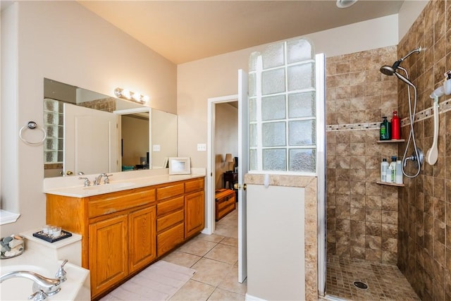 7601 Dijon Lake Dr, Corpus Christi, TX 78413 - bathroom featuring a tile shower, vanity, tile patterned floors, and a tub to relax in
