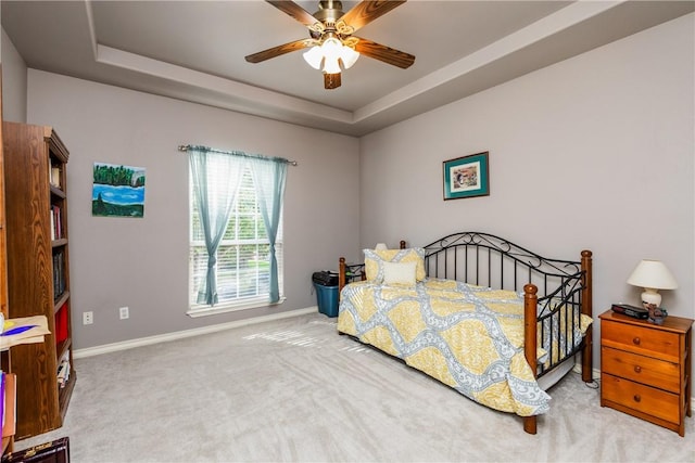 7601 Dijon Lake Dr, Corpus Christi, TX 78413 - carpeted bedroom featuring a tray ceiling and a ceiling fan