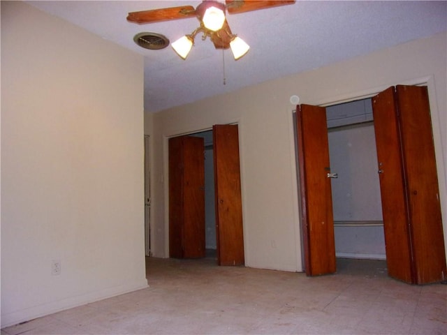 spare room featuring ceiling fan