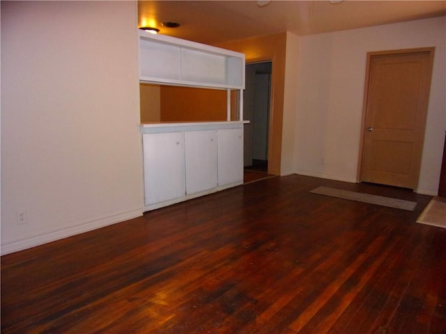 interior space with dark wood-type flooring