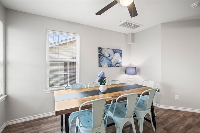 dining area with dark hardwood / wood-style flooring and ceiling fan