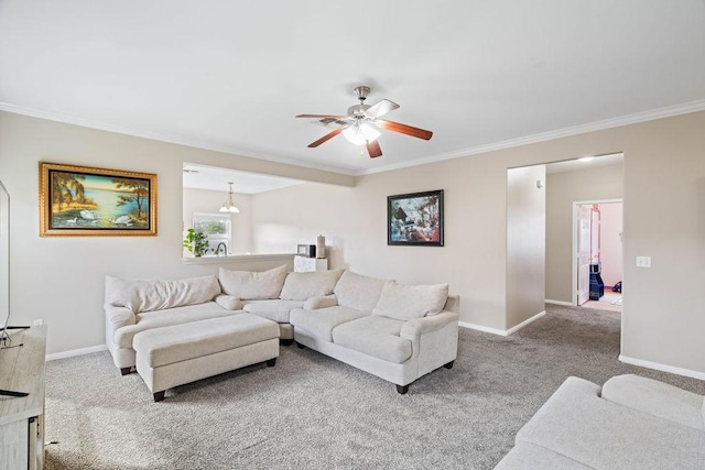 7558 Angelwing Dr, Corpus Christi, TX 78414 - carpeted living room featuring crown molding, baseboards, and ceiling fan