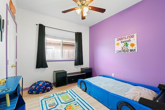 7558 Angelwing Dr, Corpus Christi, TX 78414 - bedroom featuring a ceiling fan and wood finished floors