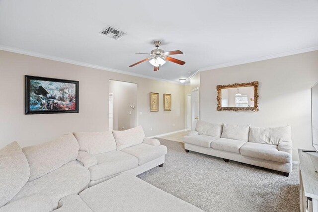 7558 Angelwing Dr, Corpus Christi, TX 78414 - carpeted living room featuring crown molding, a ceiling fan, baseboards, and visible vents