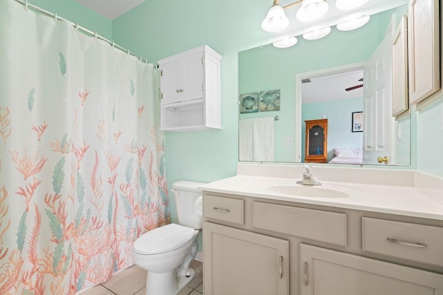 7558 Angelwing Dr, Corpus Christi, TX 78414 - ensuite bathroom with vanity, tile patterned floors, toilet, and ensuite bath