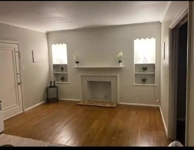 unfurnished living room featuring wood-type flooring