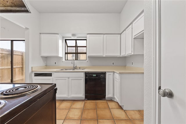 kitchen featuring sink, black appliances, white cabinets, and light tile patterned flooring