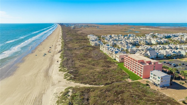 aerial view featuring a beach view and a water view