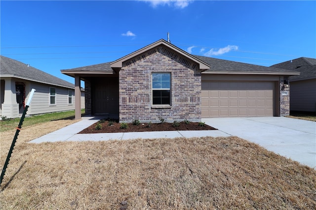 ranch-style house featuring a garage