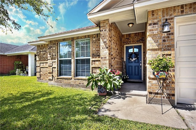 3137 Masterson Dr, Corpus Christi, TX 78415 - property entrance with brick siding and a yard
