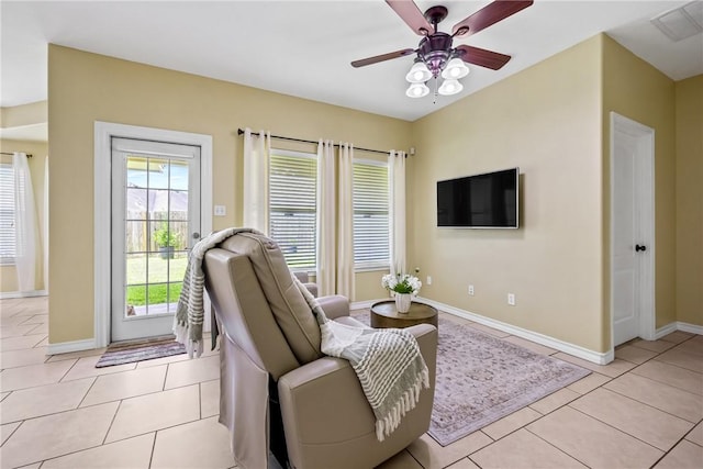 3137 Masterson Dr, Corpus Christi, TX 78415 - living area featuring a ceiling fan and light tile patterned flooring