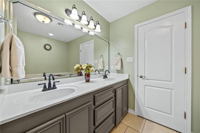 3137 Masterson Dr, Corpus Christi, TX 78415 - bathroom with double vanity and tile patterned flooring