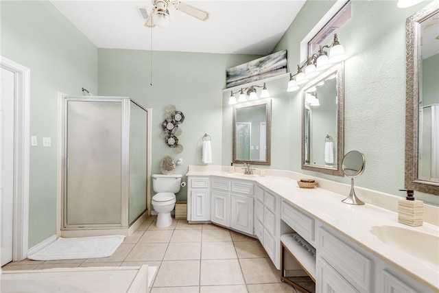 bathroom with walk in shower, tile patterned flooring, vanity, and ceiling fan