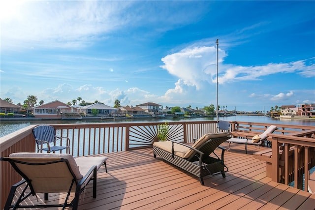 wooden deck with a water view