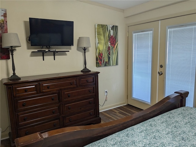 14300 S Padre Island Dr Unit 223, Corpus Christi, TX 78418 - bedroom with french doors and dark wood-style floors