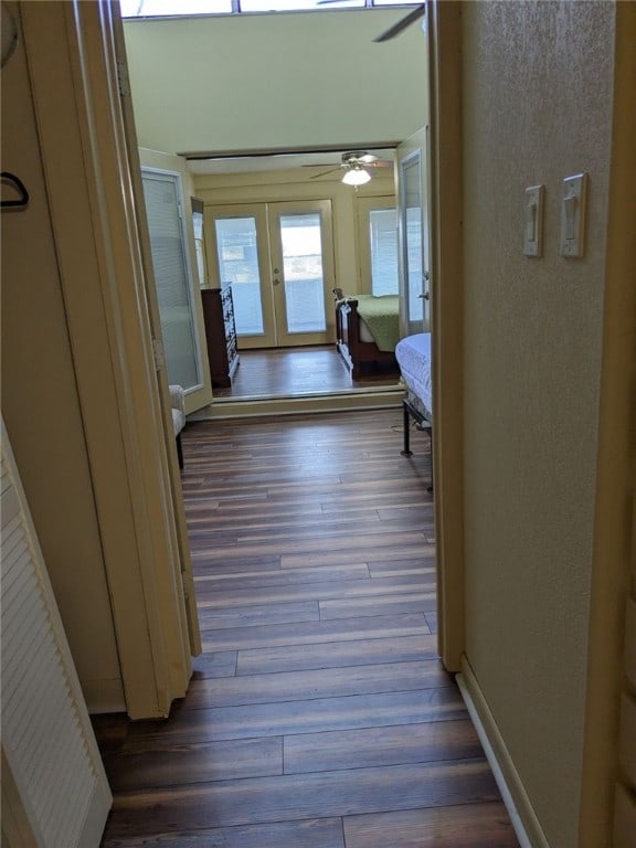 14300 S Padre Island Dr Unit 223, Corpus Christi, TX 78418 - hall featuring french doors, dark wood-type flooring, and a textured wall