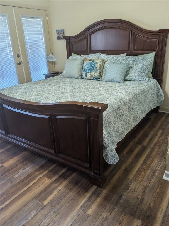 14300 S Padre Island Dr Unit 223, Corpus Christi, TX 78418 - bedroom featuring dark wood-style flooring