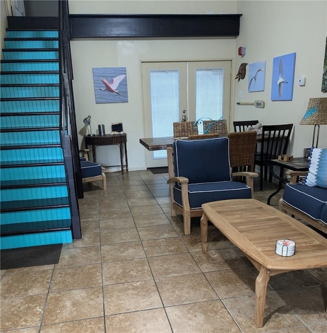 14300 S Padre Island Dr Unit 223, Corpus Christi, TX 78418 - living room featuring french doors, stairway, and tile patterned floors