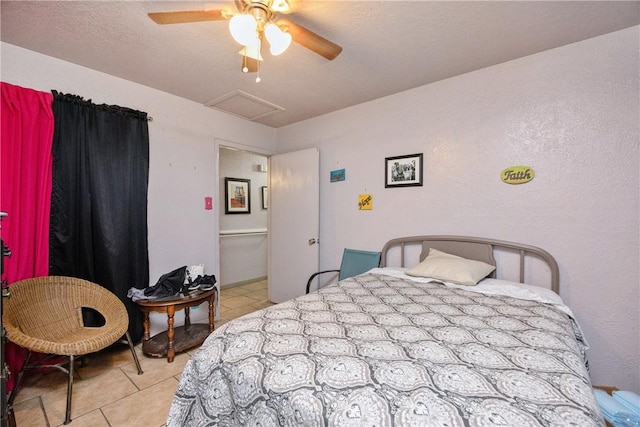 bedroom featuring ceiling fan and light tile patterned floors