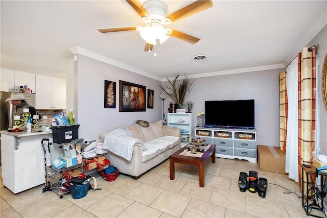 living room with ceiling fan, light tile patterned floors, and crown molding