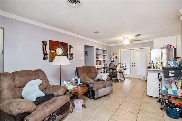 living room featuring ornamental molding, ceiling fan, french doors, and light tile patterned floors