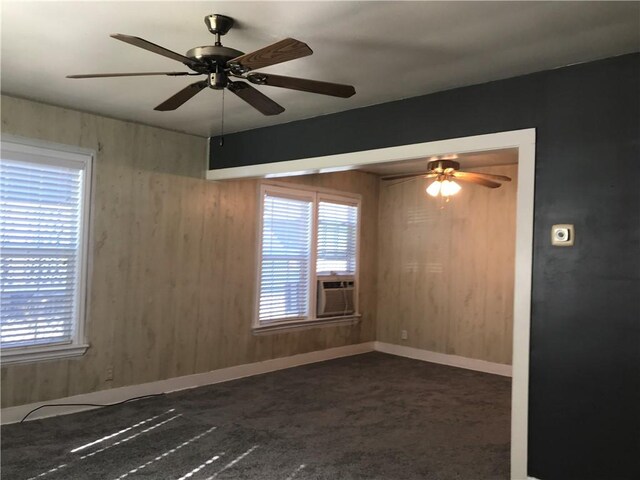 1222 18th St, Corpus Christi, TX 78405 - unfurnished room featuring dark carpet, ceiling fan, and cooling unit