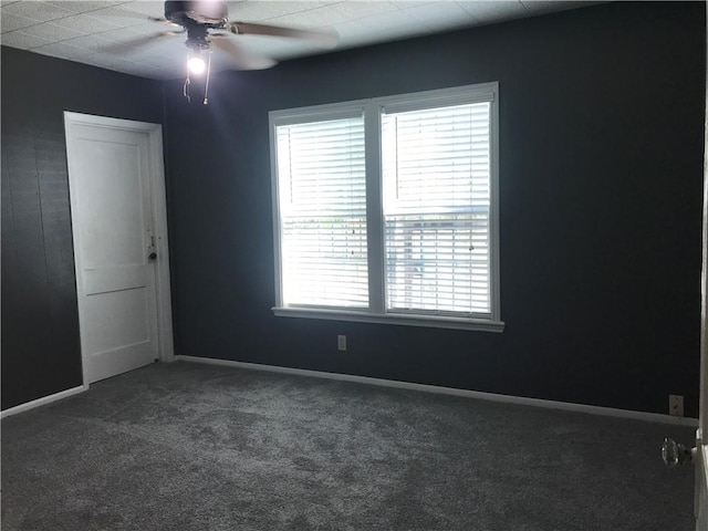 1222 18th St, Corpus Christi, TX 78405 - spare room with dark carpet and a ceiling fan