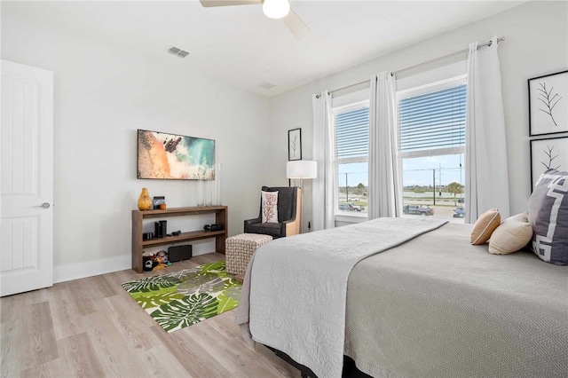 bedroom featuring ceiling fan and light hardwood / wood-style flooring