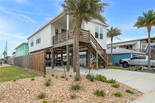 rear view of house featuring a carport