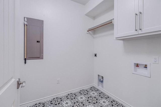 washroom with cabinets, hookup for an electric dryer, washer hookup, and electric panel