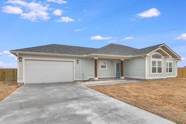 single story home featuring a garage