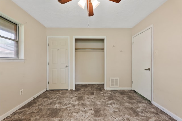 unfurnished bedroom featuring a textured ceiling and ceiling fan