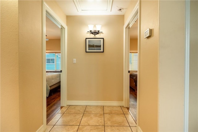 1549 S Commercial St Unit 8, Aransas Pass, TX 78336 - hall featuring light tile patterned floors and baseboards