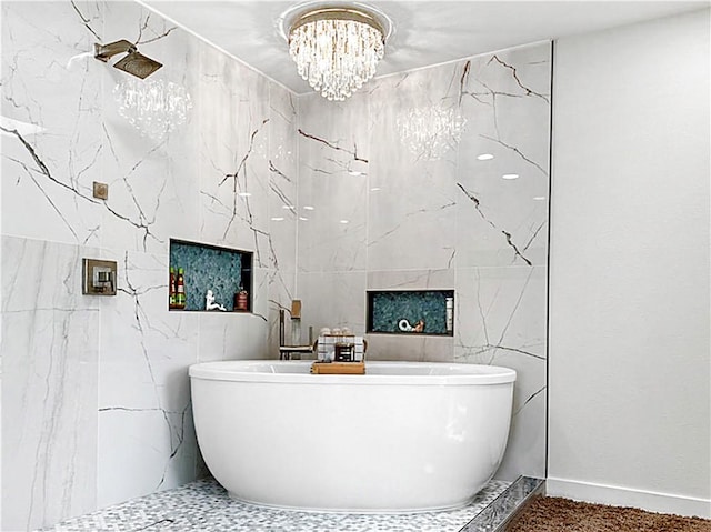 178 Smyth St, Port Oconnor, TX 77982 - full bathroom featuring a freestanding tub, a chandelier, and baseboards
