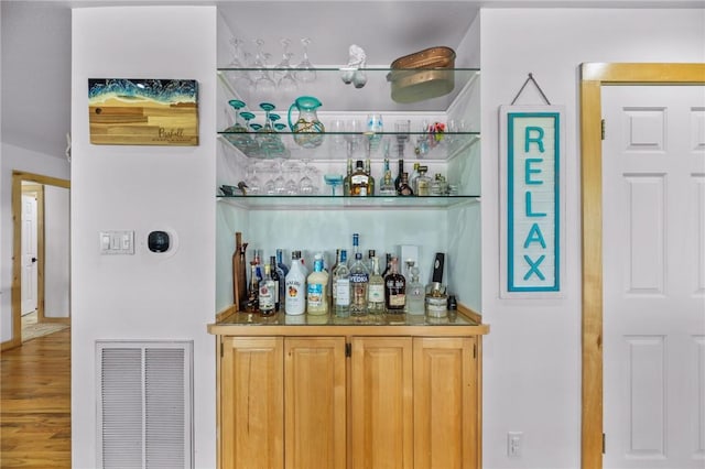178 Smyth St, Port Oconnor, TX 77982 - indoor dry bar with wood finished floors