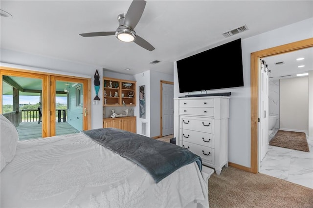 178 Smyth St, Port Oconnor, TX 77982 - bedroom with access to exterior, baseboards, light marble finish flooring, and ceiling fan