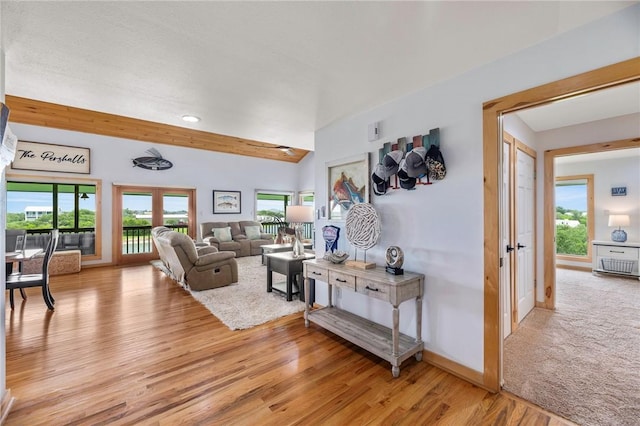 178 Smyth St, Port Oconnor, TX 77982 - living area with light wood-style flooring, healthy amount of natural light, french doors, and baseboards