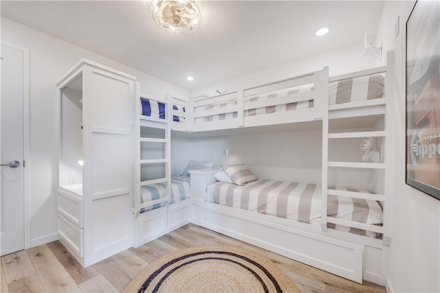 bedroom with light hardwood / wood-style floors