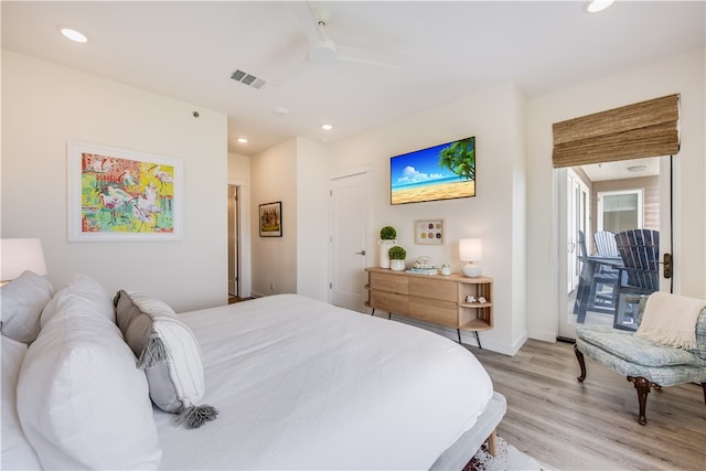 bedroom with light wood-type flooring and ceiling fan