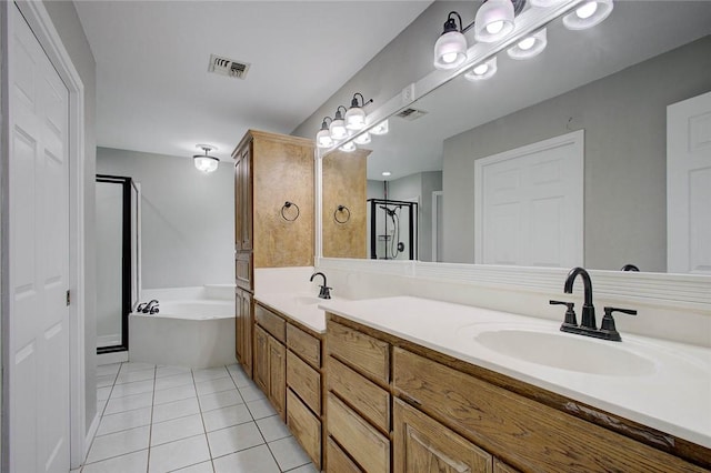 2111 Buckeye Dr, Ingleside, TX 78362 - full bath featuring tile patterned floors, a stall shower, a bath, and double vanity