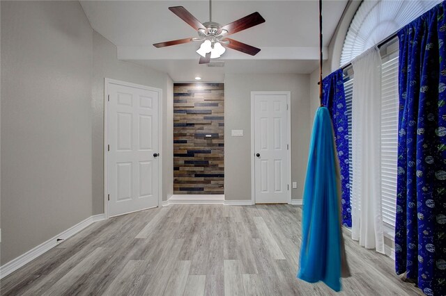 interior space with light hardwood / wood-style flooring and ceiling fan