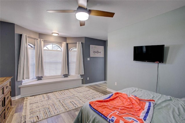 2111 Buckeye Dr, Ingleside, TX 78362 - bedroom featuring light wood-type flooring, baseboards, and a ceiling fan