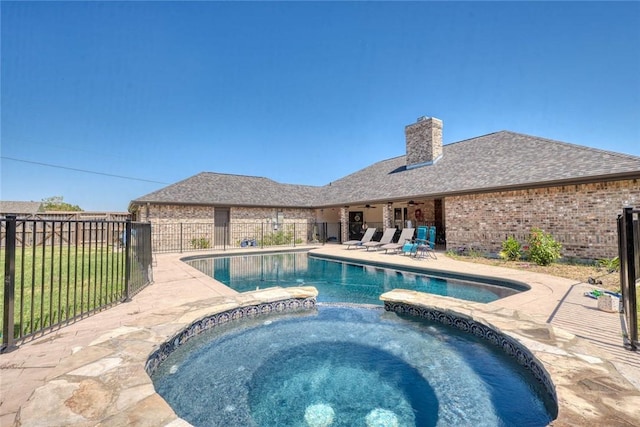 2111 Buckeye Dr, Ingleside, TX 78362 - view of pool with a pool with connected hot tub and a patio