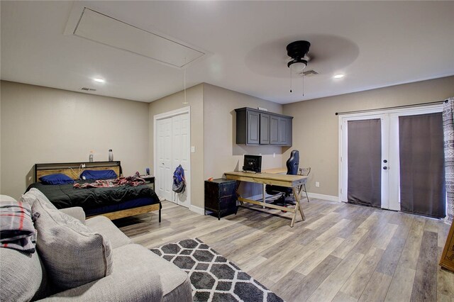 bedroom with hardwood / wood-style floors and ceiling fan