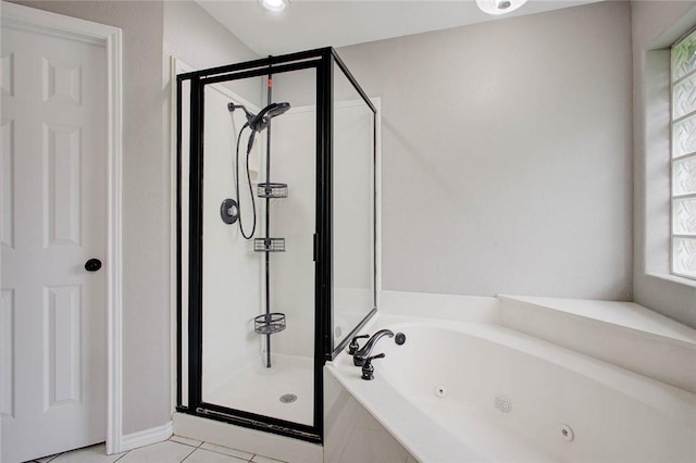 2111 Buckeye Dr, Ingleside, TX 78362 - full bath featuring a stall shower, a tub with jets, and tile patterned flooring