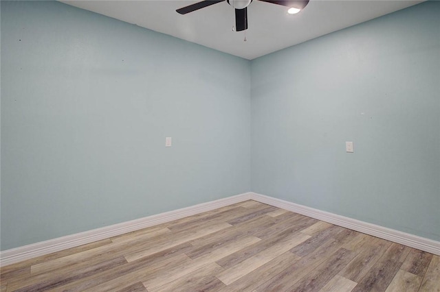 2111 Buckeye Dr, Ingleside, TX 78362 - unfurnished room with ceiling fan, light wood finished floors, and baseboards