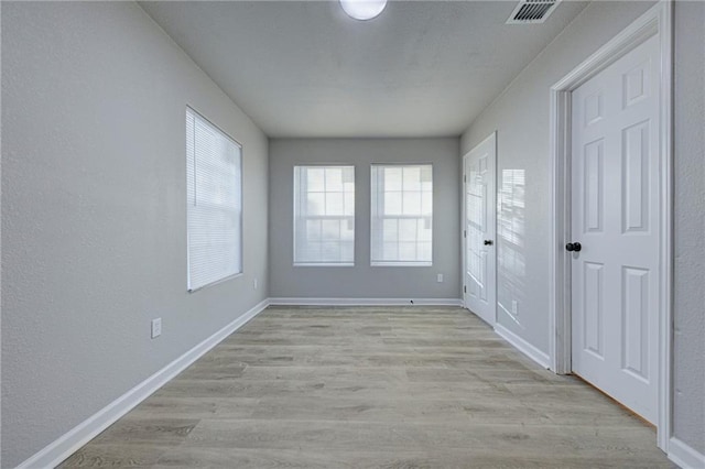 4330 Valdez Dr, Corpus Christi, TX 78416 - unfurnished room with healthy amount of natural light and light wood finished floors