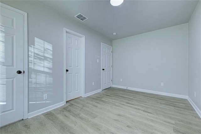 4330 Valdez Dr, Corpus Christi, TX 78416 - unfurnished bedroom with light wood-style flooring and baseboards