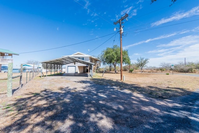 view of front of house with a carport